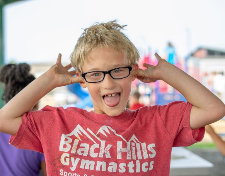 Boy Making Faces At YMCA Summer Day Camp