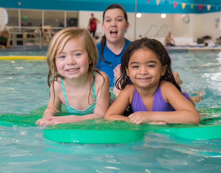 Practicing Paddling At YMCA Aquatics Swim Lessons