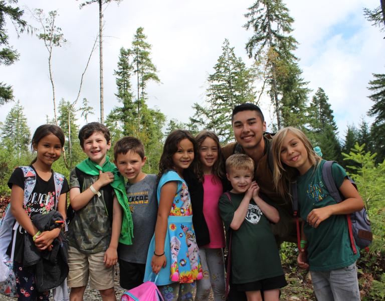 Helena day camp participants pose on the trail