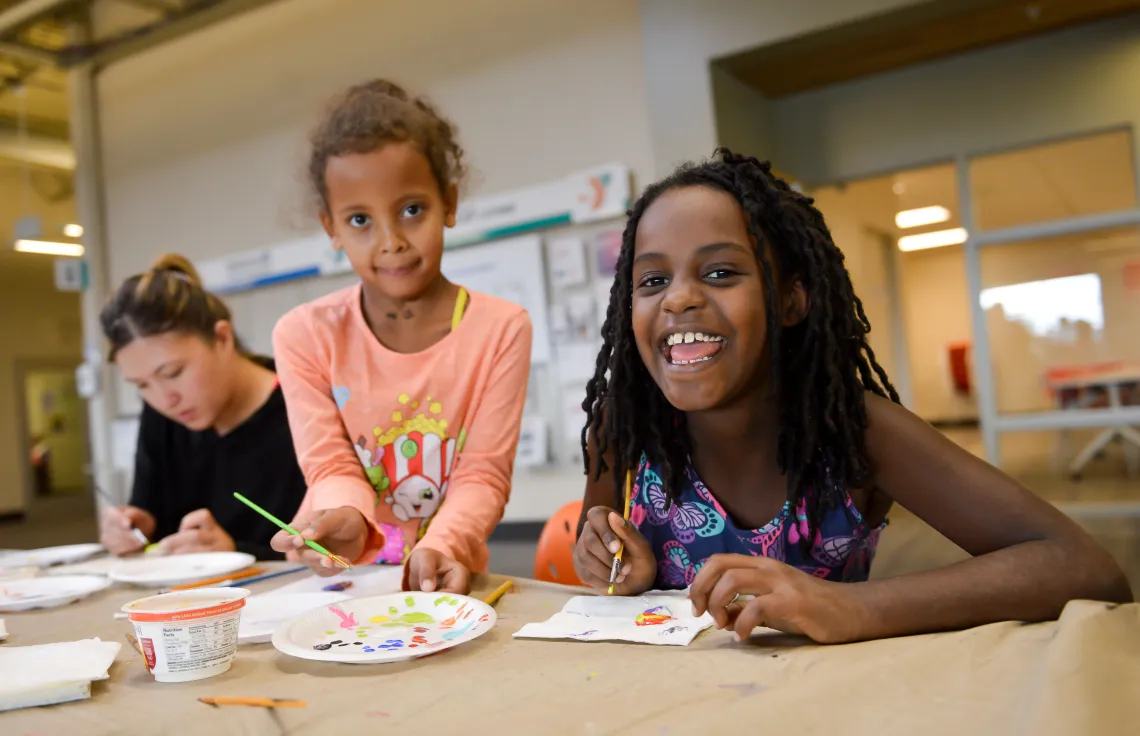 Friends Painting Together at YMCA Visual Arts Class
