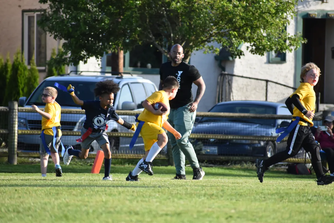 Action shot of a flag football game at the YMCA