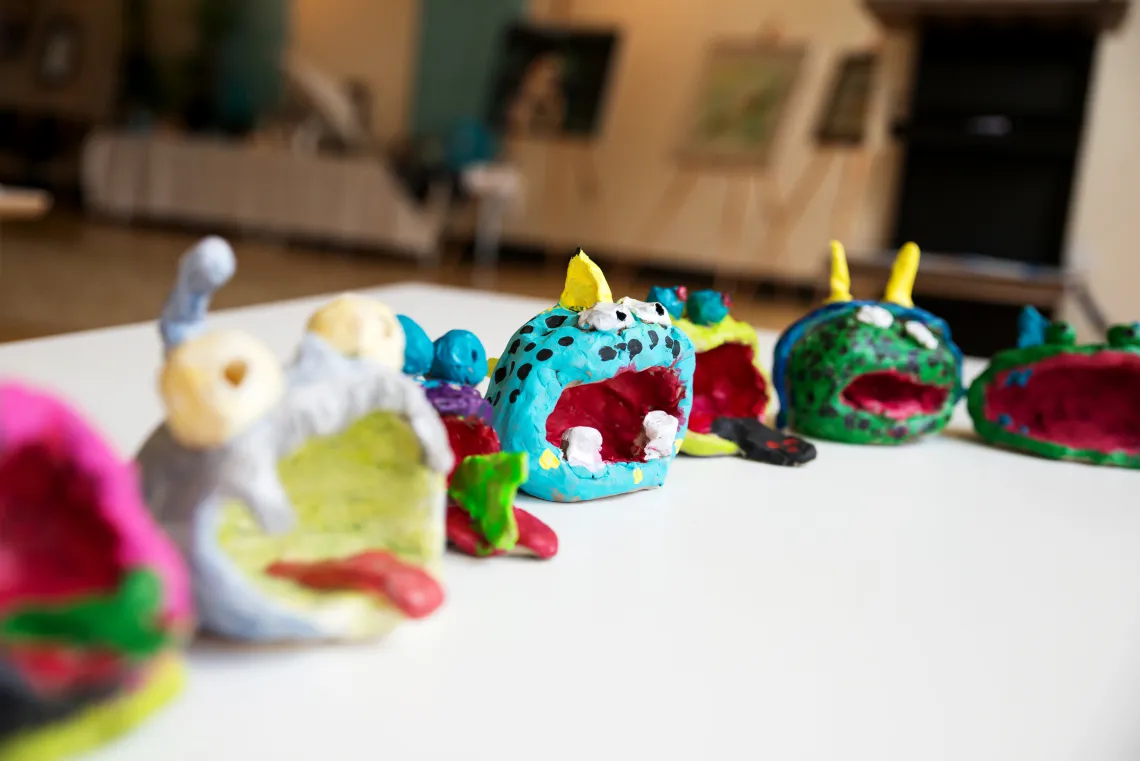 Photo of art students' ceramic creations in the art studio at the YMCA.