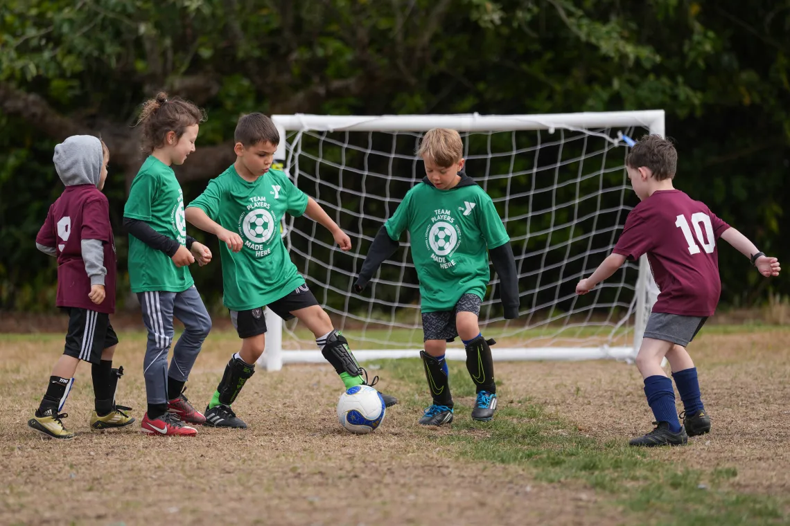 Swarming the Ball at YMCA Youth Soccer League