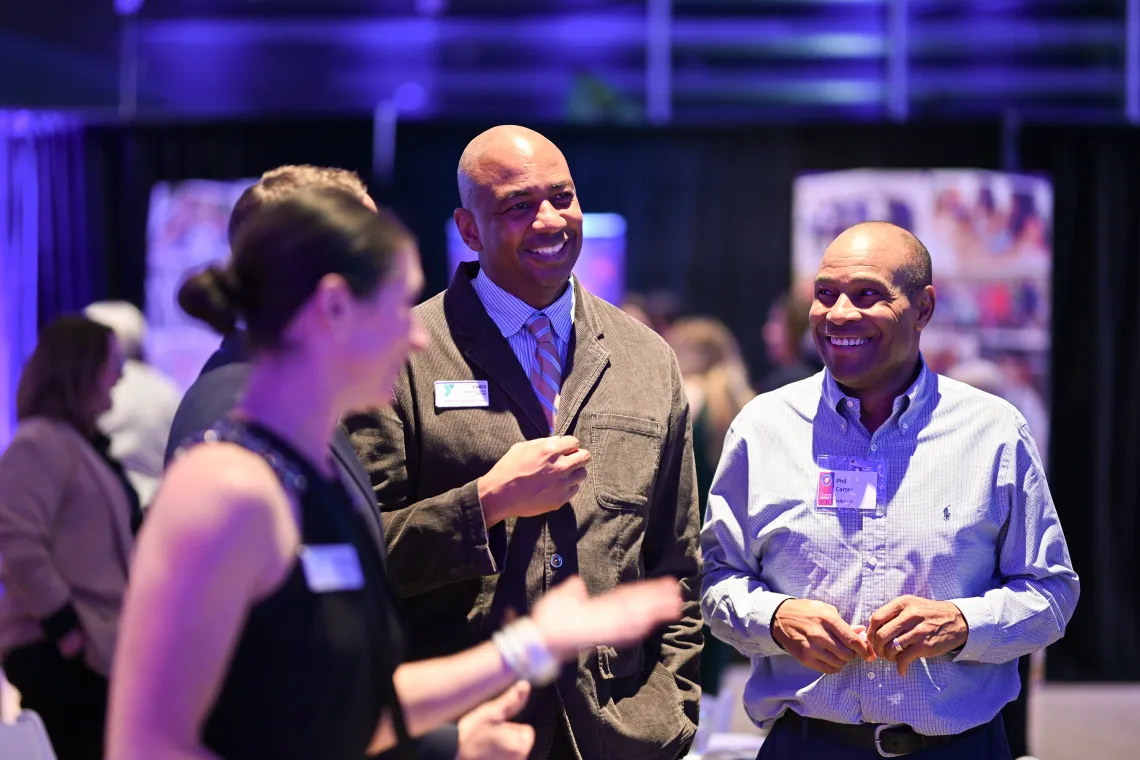 Friends Laughing at YMCA Donor Gala