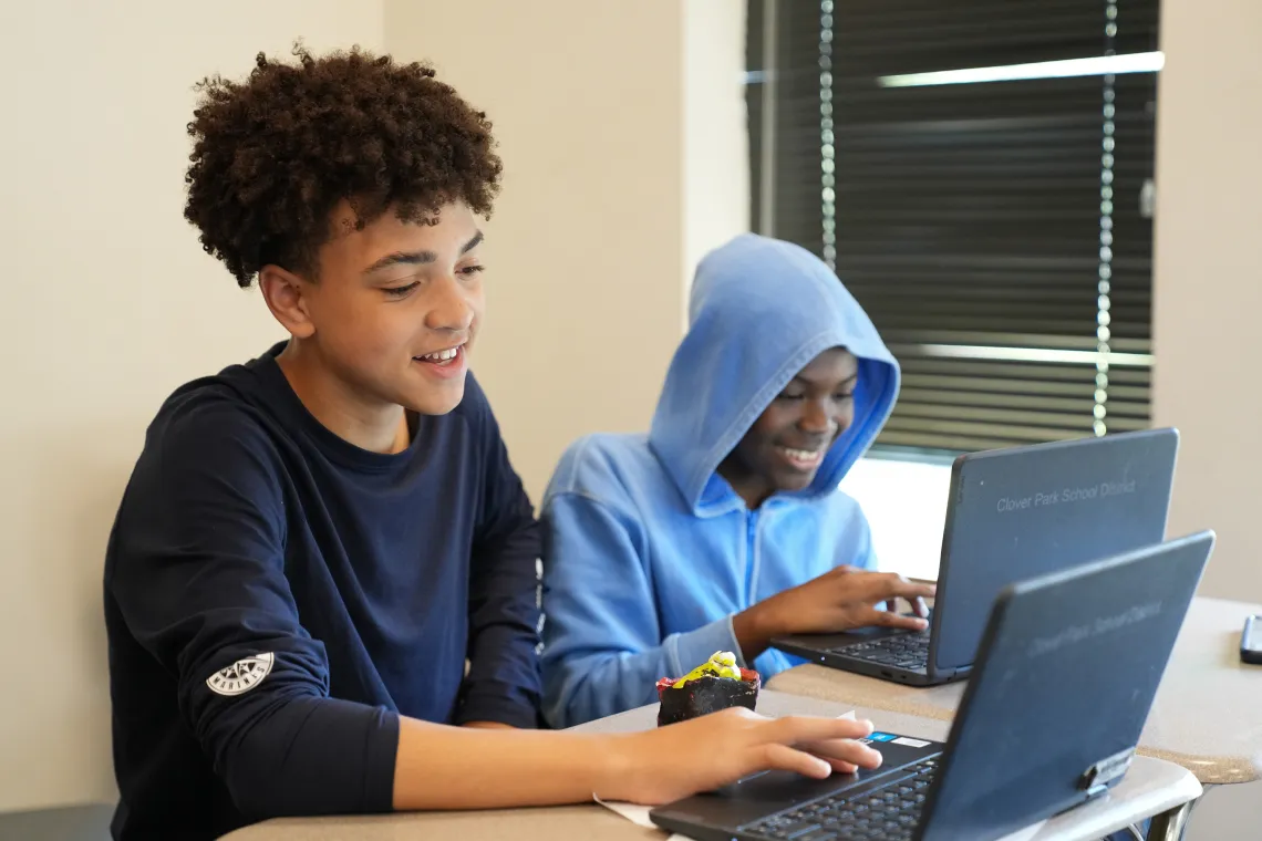 Computer Learning with Friend at YMCA Teen Late Nite