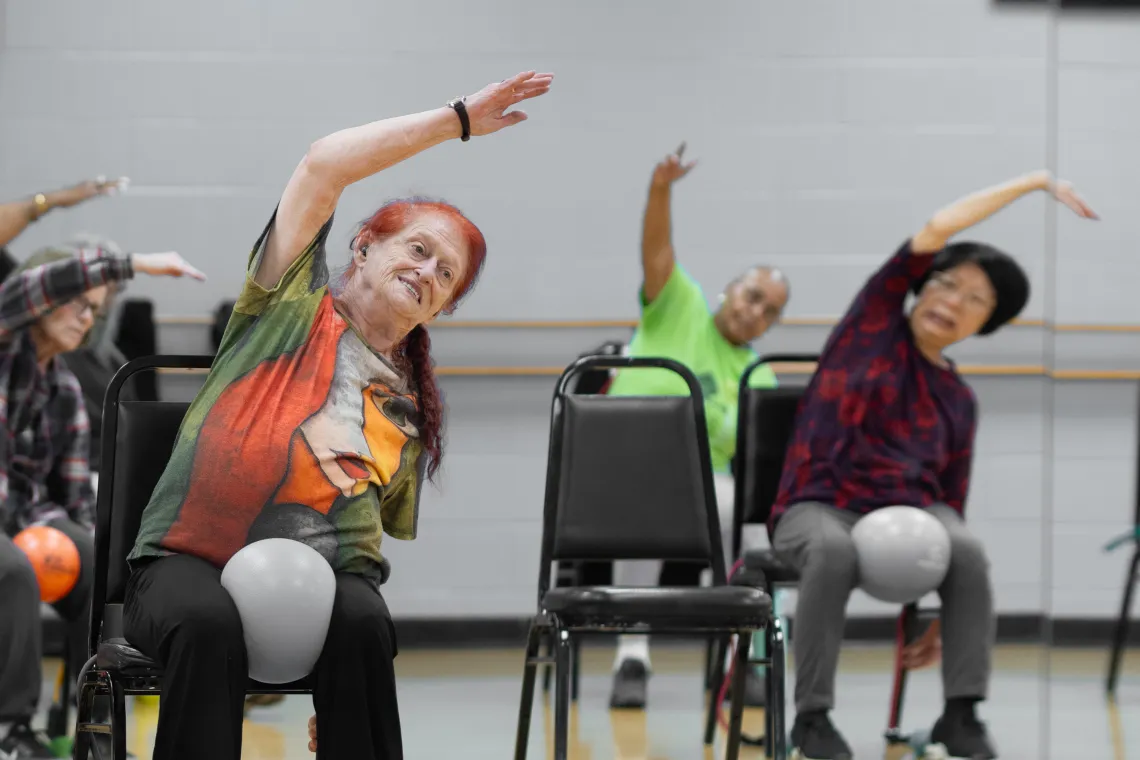 Nancy Stretching at Lakewood Family YMCA
