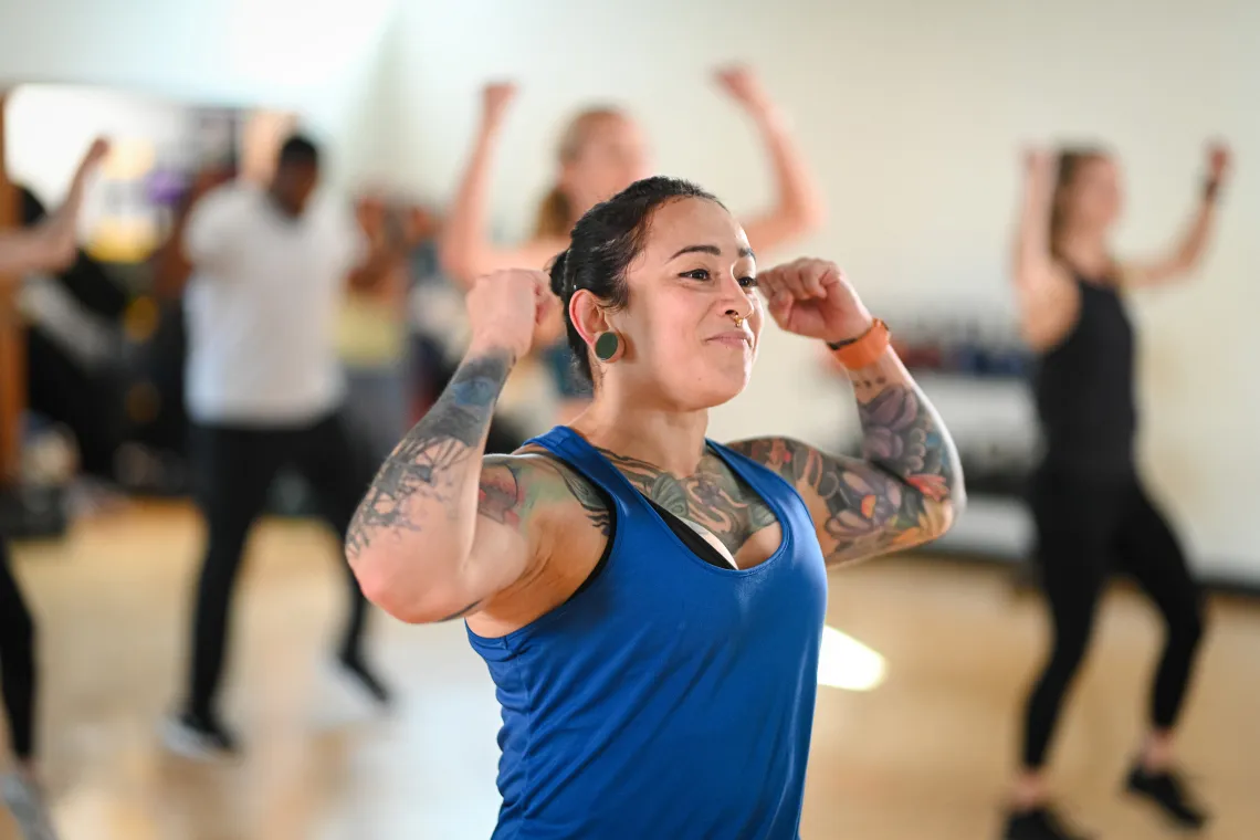 Dancing with Hands Overhead in YMCA Group Exercise Class