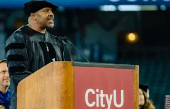 Al speaking at his PhD graduation