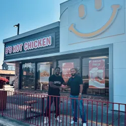 Kwabi in front of B's Hot Chicken