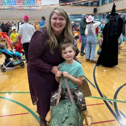 Parent and Dinosaur Rider at Jack-O’-Lantern Jubilee
