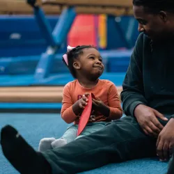Father and Daughter Smiling at One Another YMCA Youth Programming