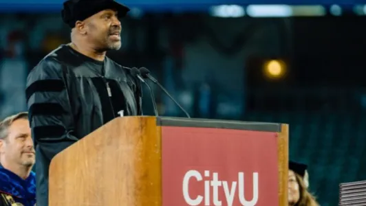 Al speaking at his PhD graduation