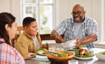 YMCA Healthy Living Eating Salad With Family