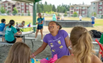YMCA Summer Day Camps Where Girls Are Having Fun At Table