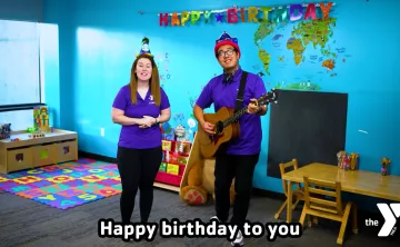 Gabriel and Lauren teach the Happy Birthday song to kids on YMCA360.
