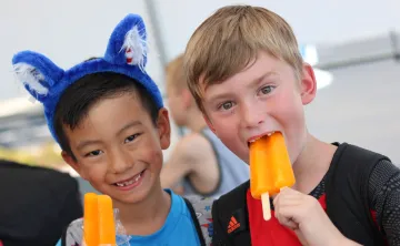 Friends Eating Popsicles at YMCA Healthy Kids Day
