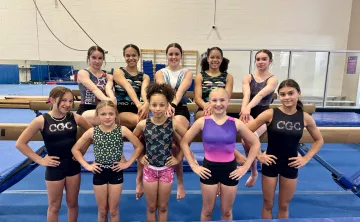 Gymnastics team poses for a team photo at the YMCA