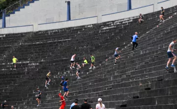Unleashed participants run the steps at the Stadium High School football field