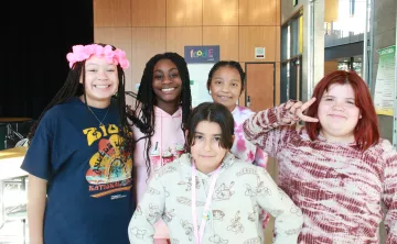 CCI students pose for a photo after school at the YMCA