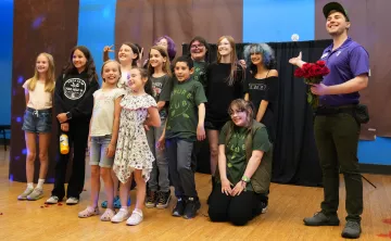 A group of youth theatre performers and their instructor, Gunnar