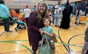 Parent and Dinosaur Rider at Jack-O’-Lantern Jubilee