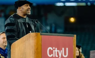 Al speaking at his PhD graduation