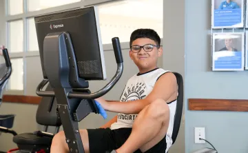 Enando on a recumbant bike