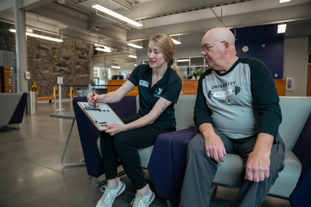 Kickstart member reviewing curated fitness plan