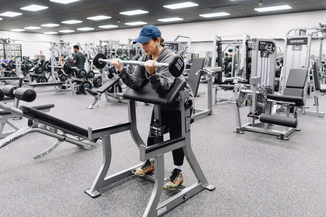 Curling Barbell on Preacher Curl Platform