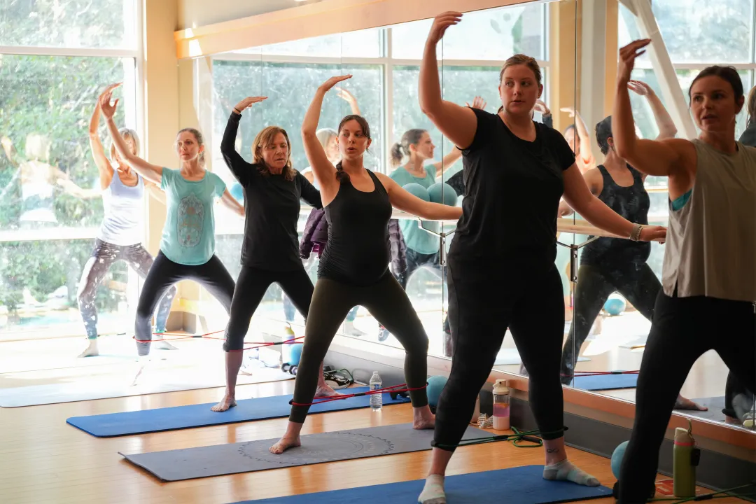 YMCA Barre Pose Arms Raised