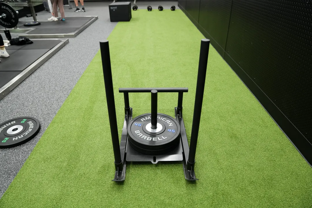 YMCA Gym Upgrades - Sled on Turf Track