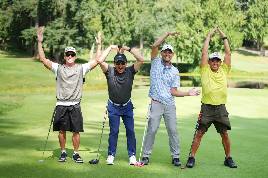 Signing YMCA at Golf Tournament